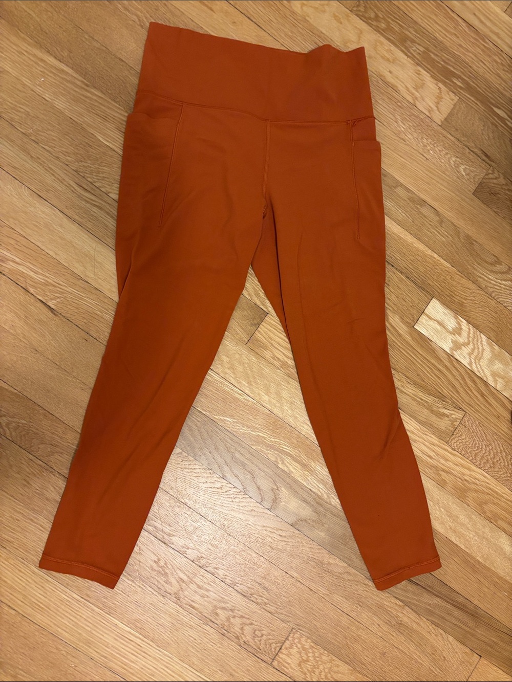 Athleta High-Rise Orange Workout Leggings with Side Pockets